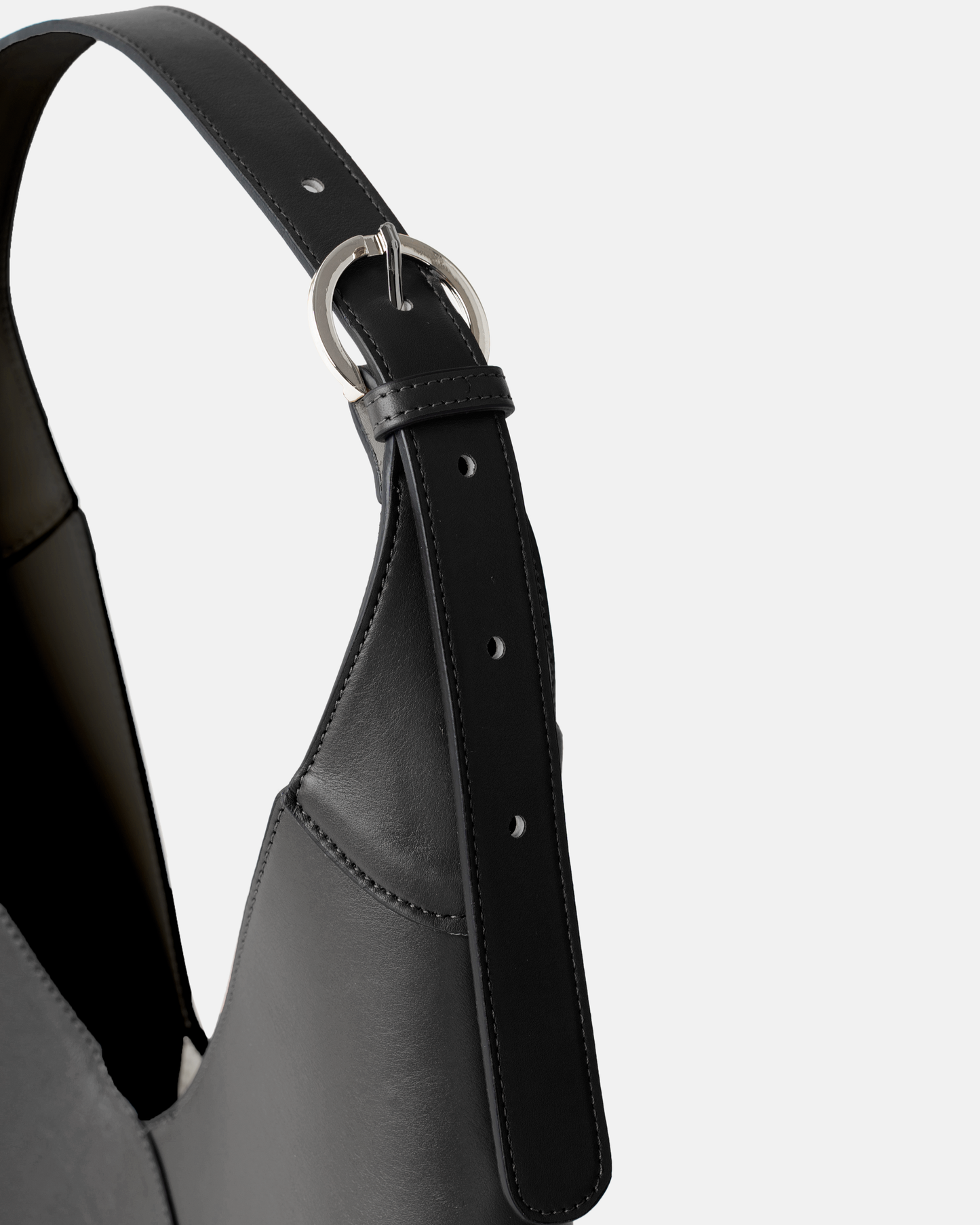 Interior view of crescent hobo bag in black smooth leather