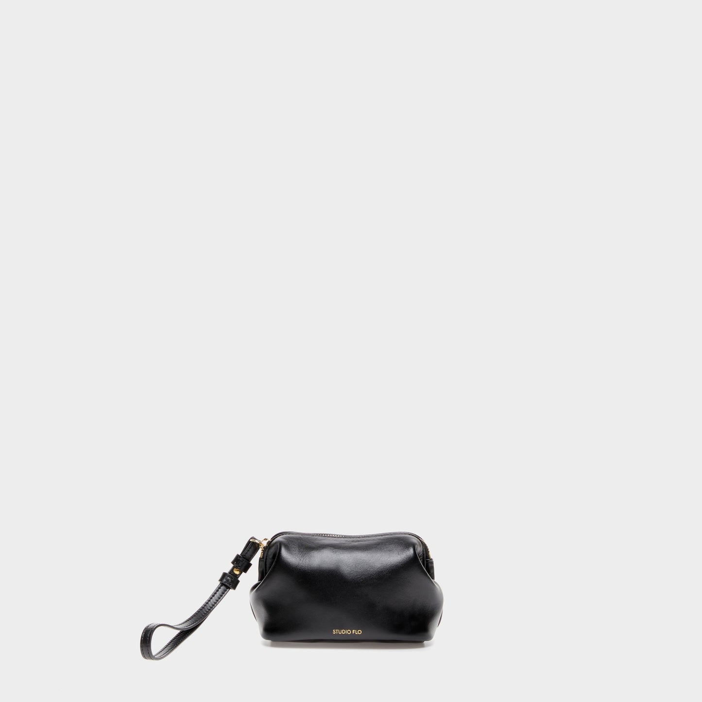 Black calfskin leather mini beauty case with curved silhouette