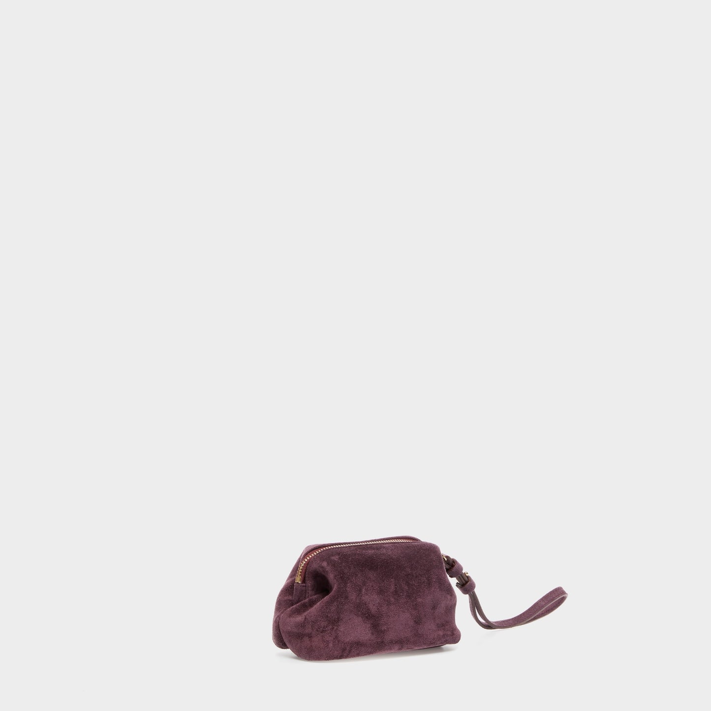 Compact suede beauty pouch in purple with detachable wrist strap