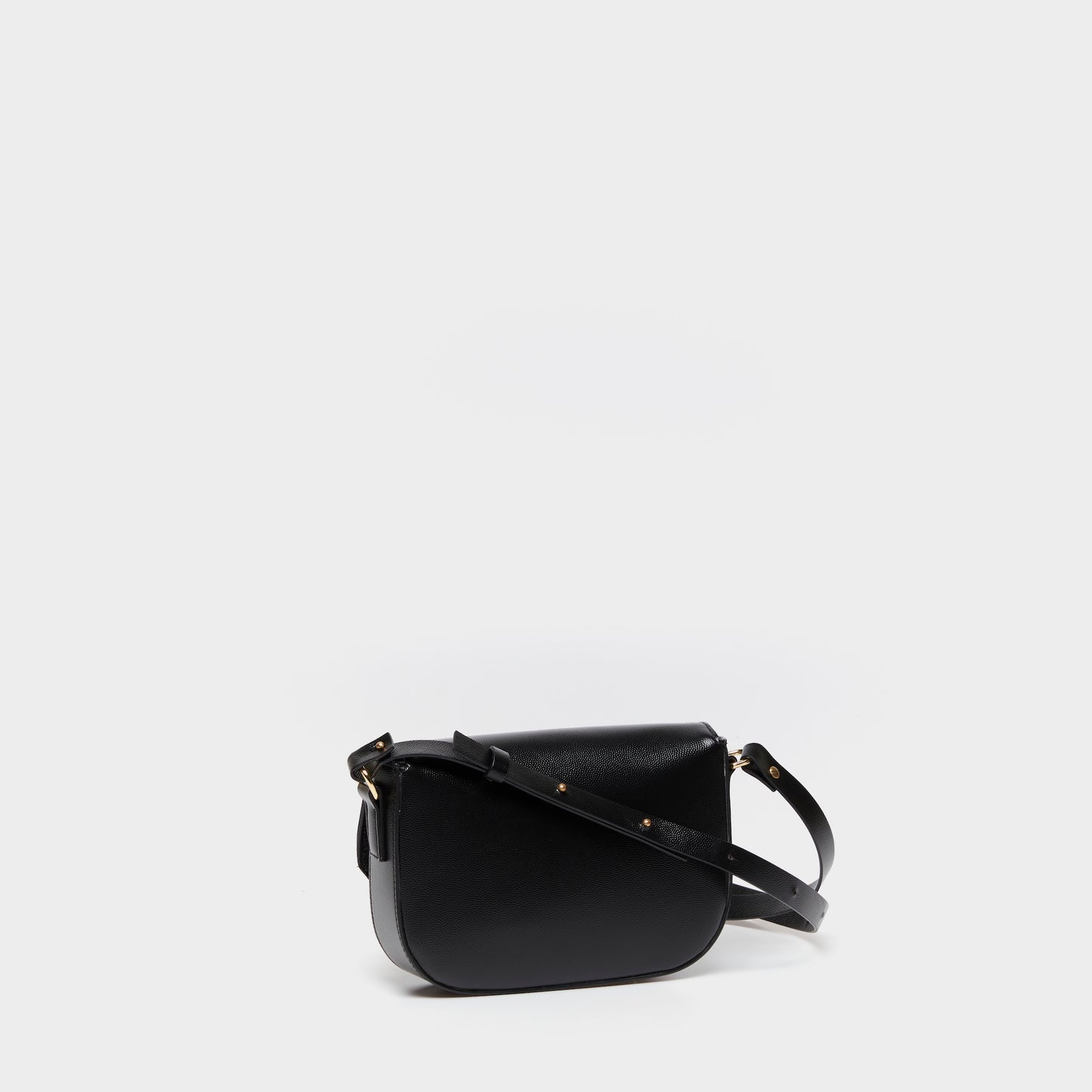 Side view of structured leather crossbody bag with adjustable strap