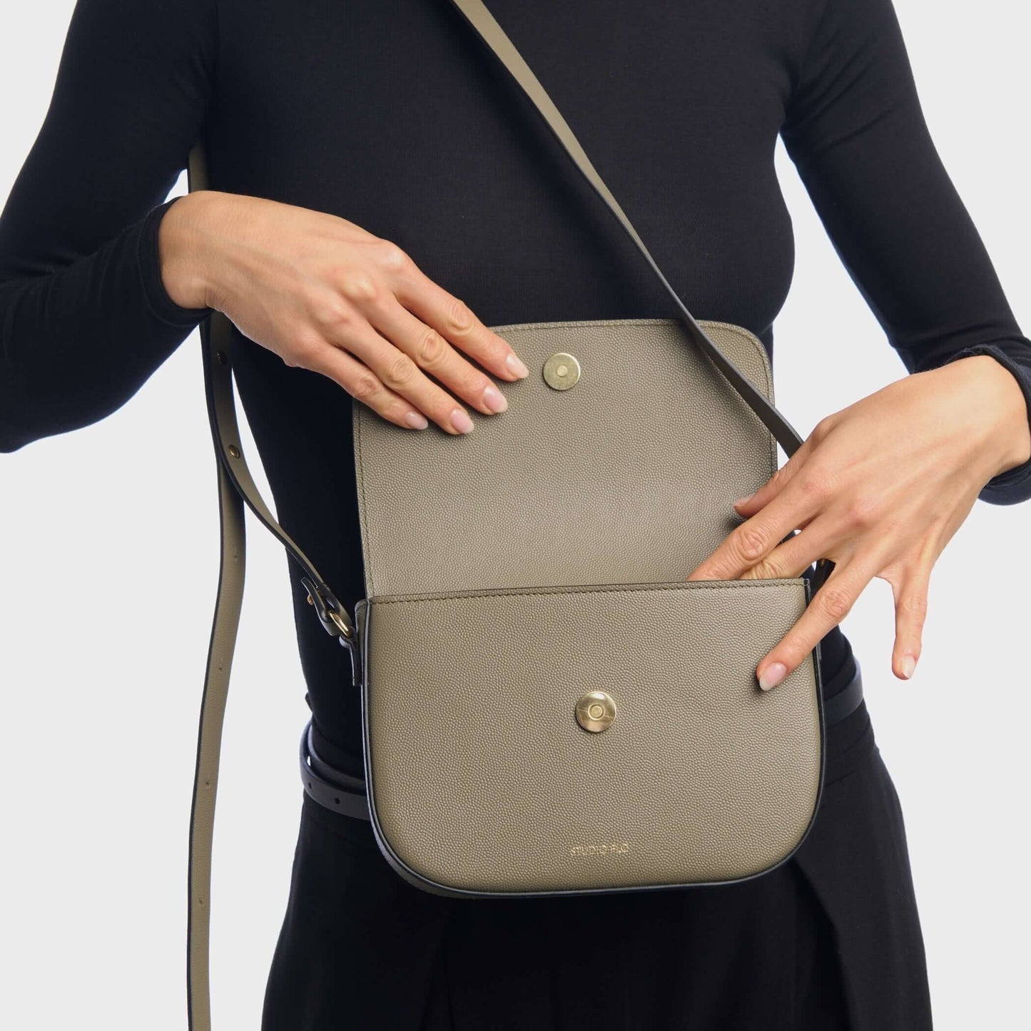 Interior view of crescent crossbody bag in calf leather with suede lining