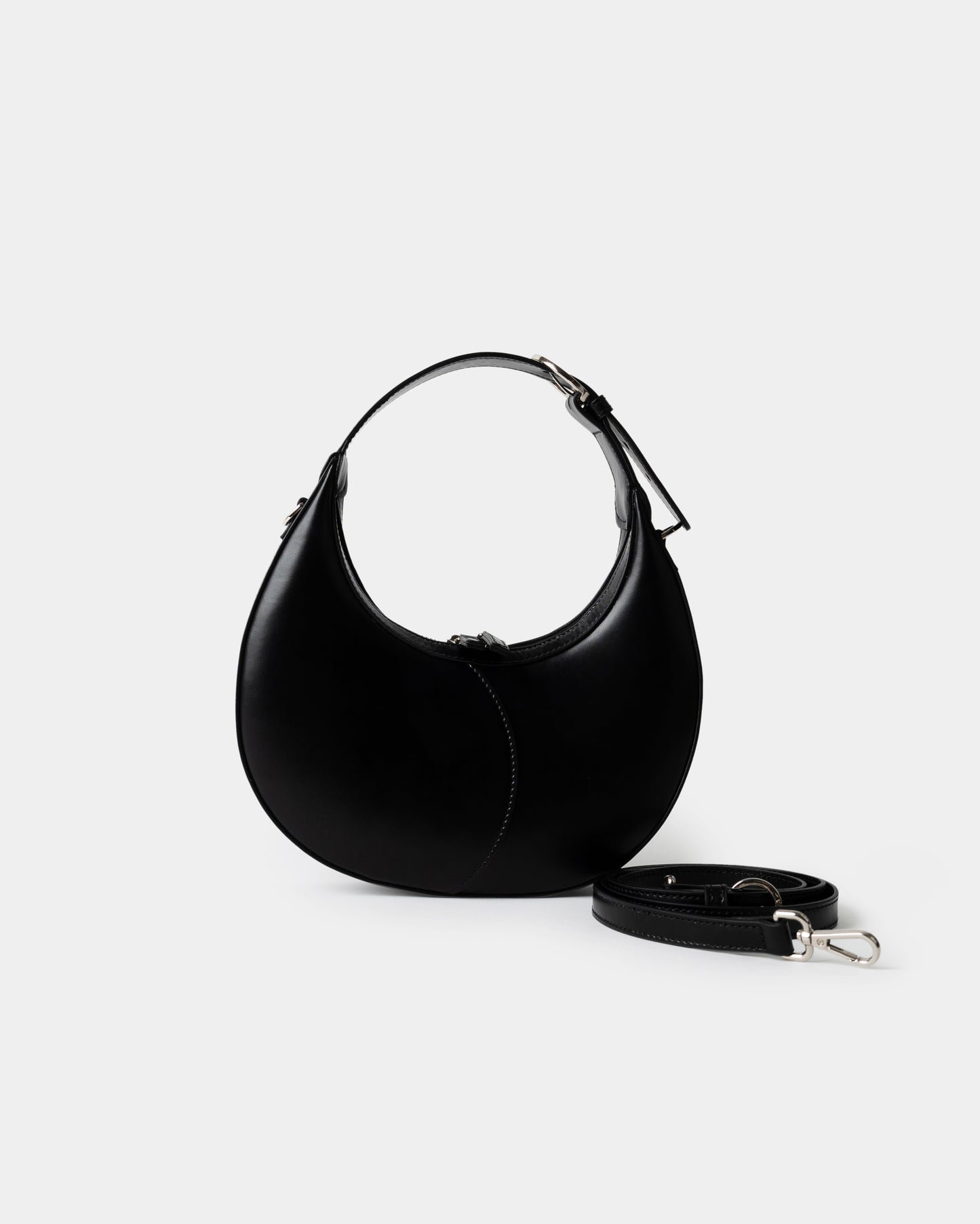 Moon Loop Mini in black with adjustable strap and refined silhouette