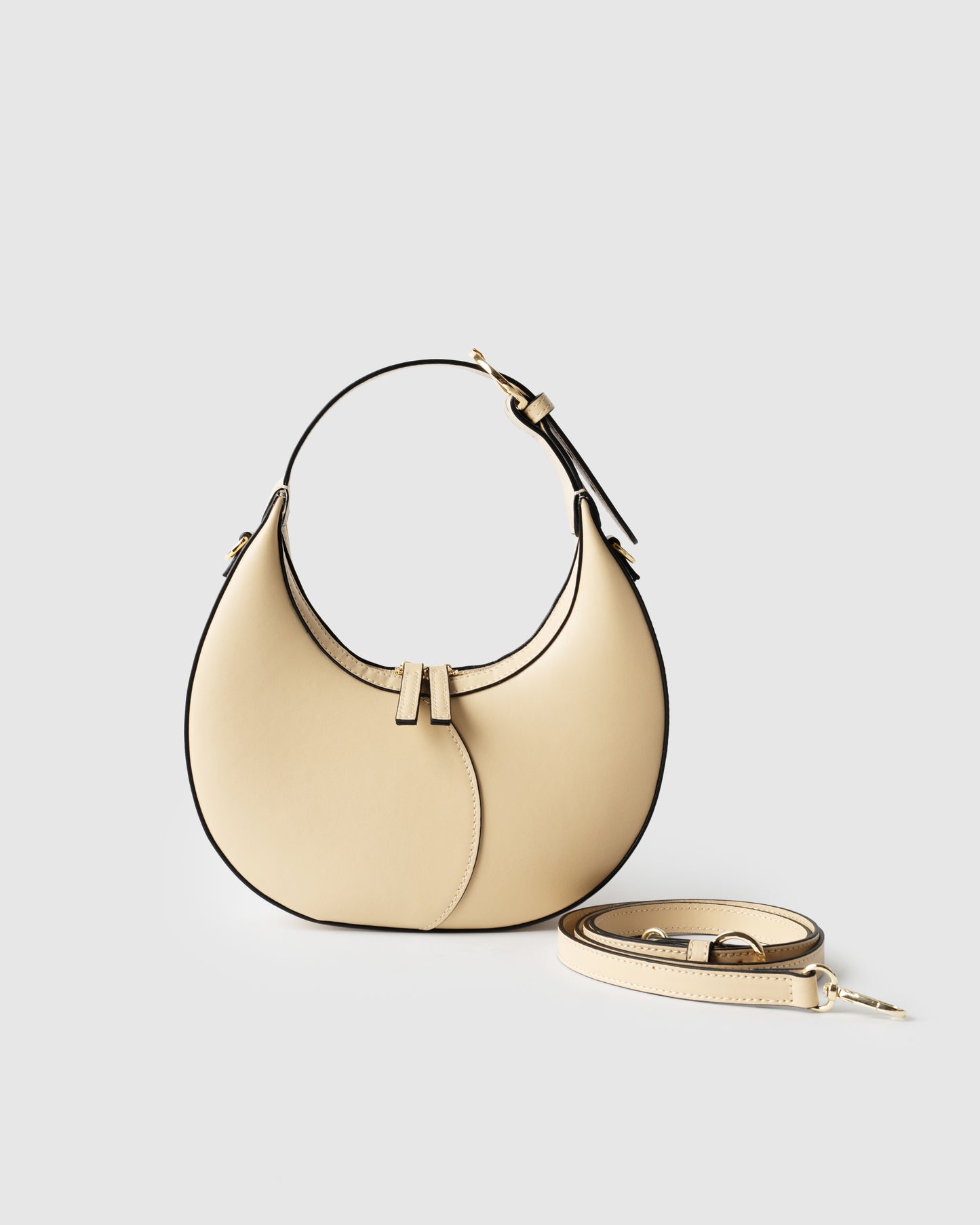 Moon Loop Mini in cream with adjustable strap and refined silhouette