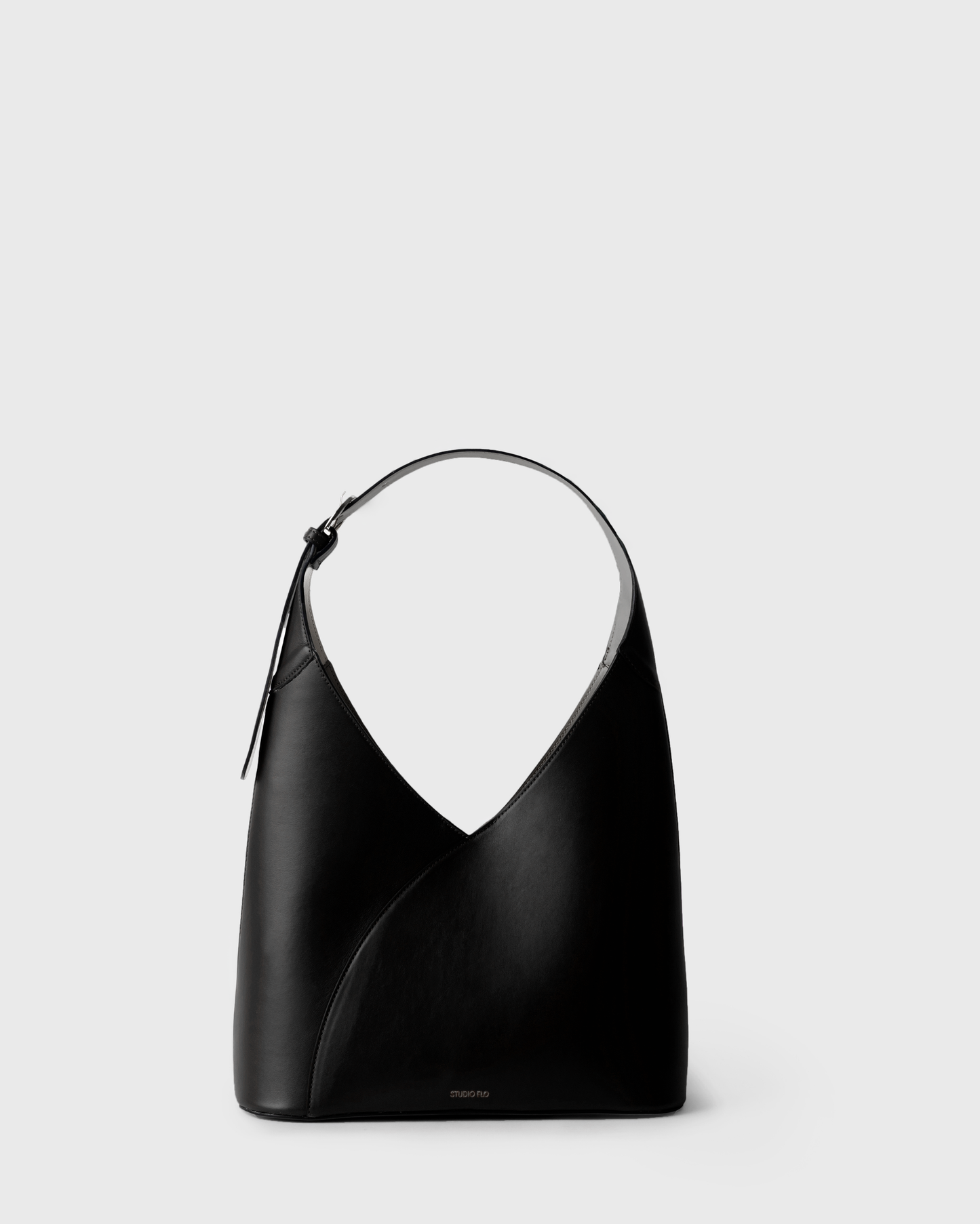 Smooth black calf leather hobo bag with sculptural curved handle