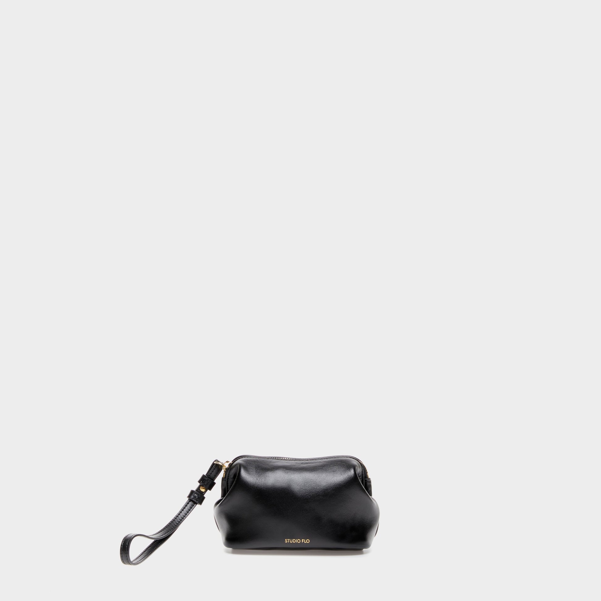 Black calfskin leather mini beauty case with curved silhouette
