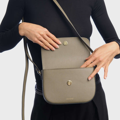 Interior view of crescent crossbody bag in calf leather with suede lining