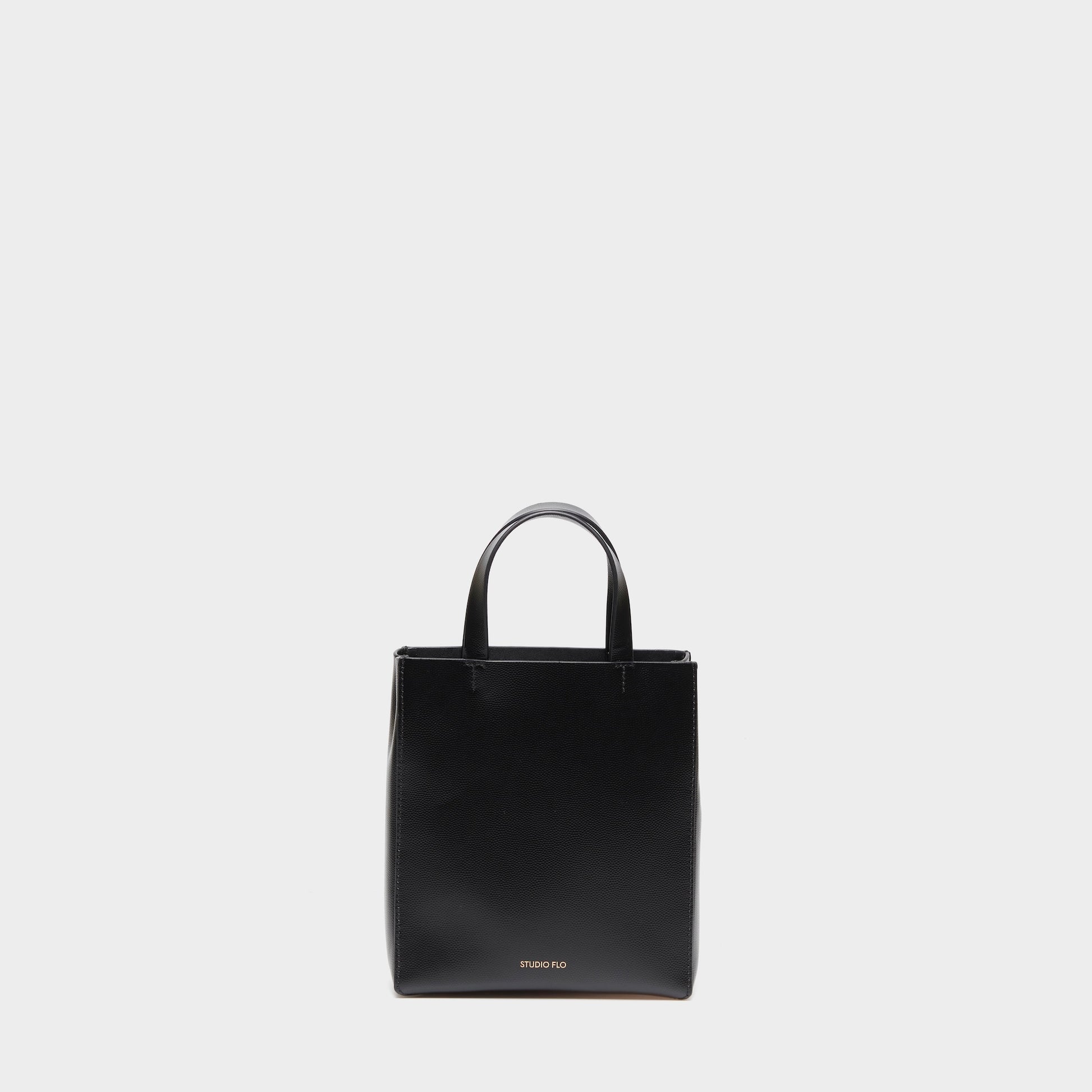 Black calfskin mini handbag with top handles and structured design