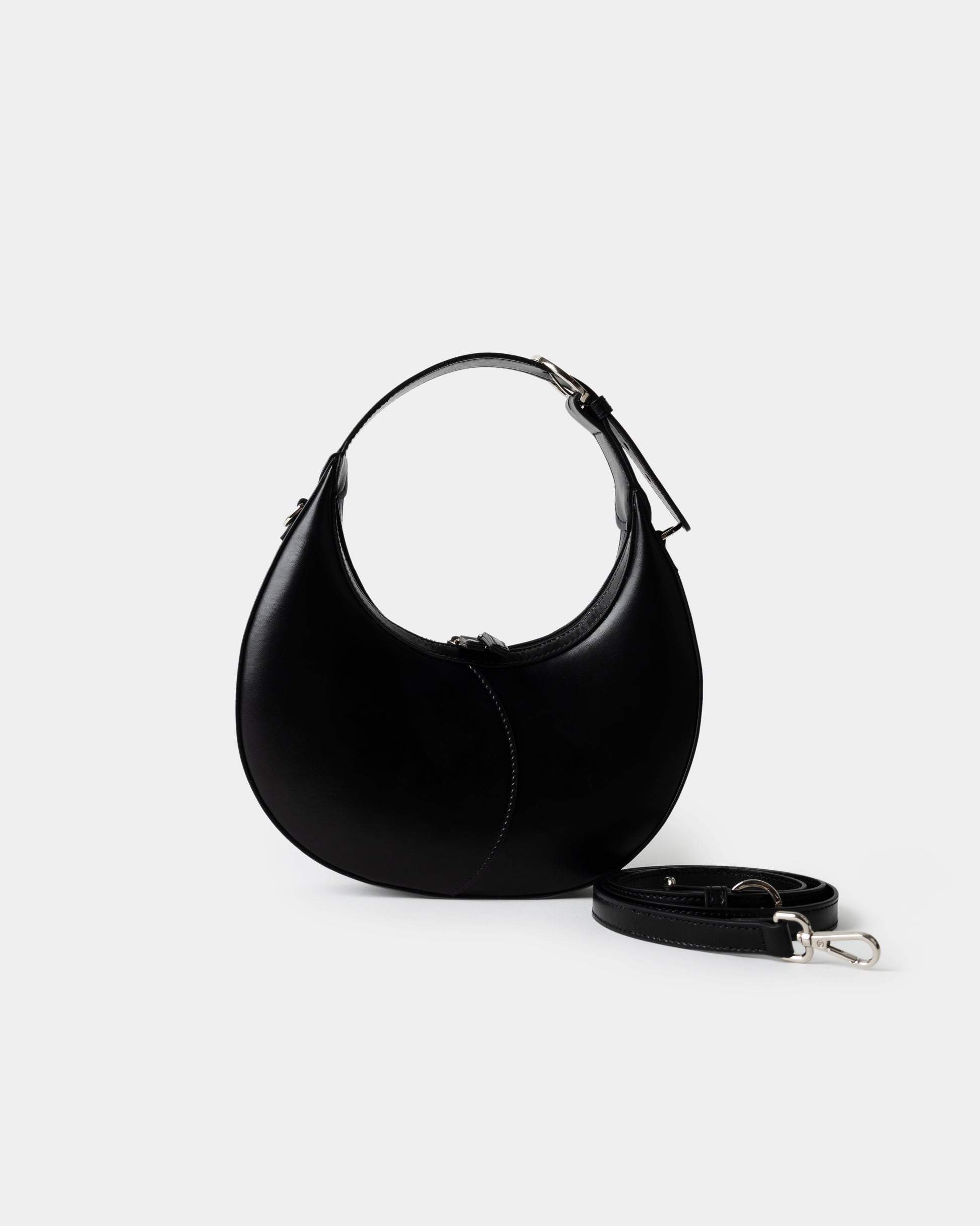 Moon Loop Mini in black with adjustable strap and refined silhouette