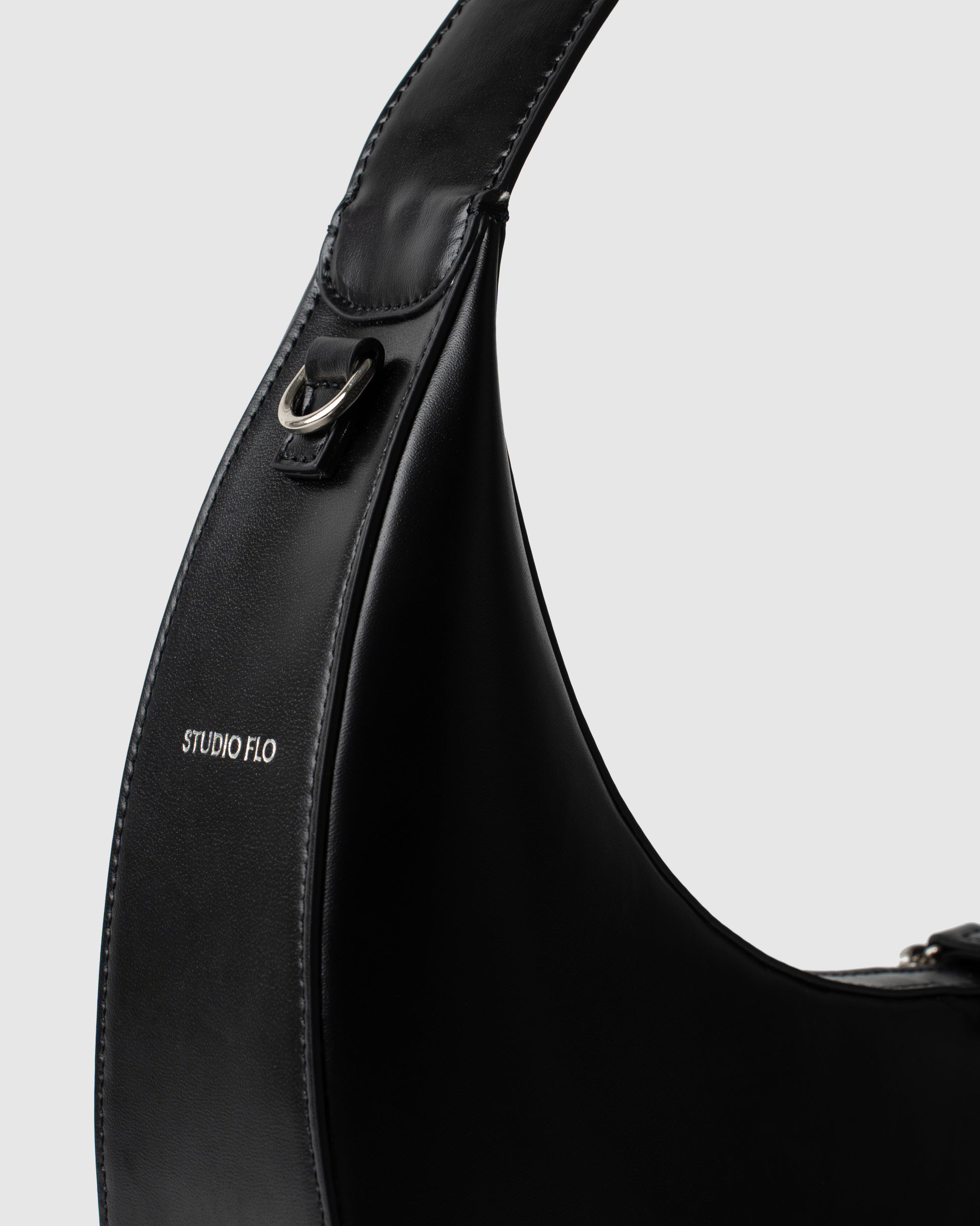 Studio Flo Logo on Moon Loop Black Leather bag