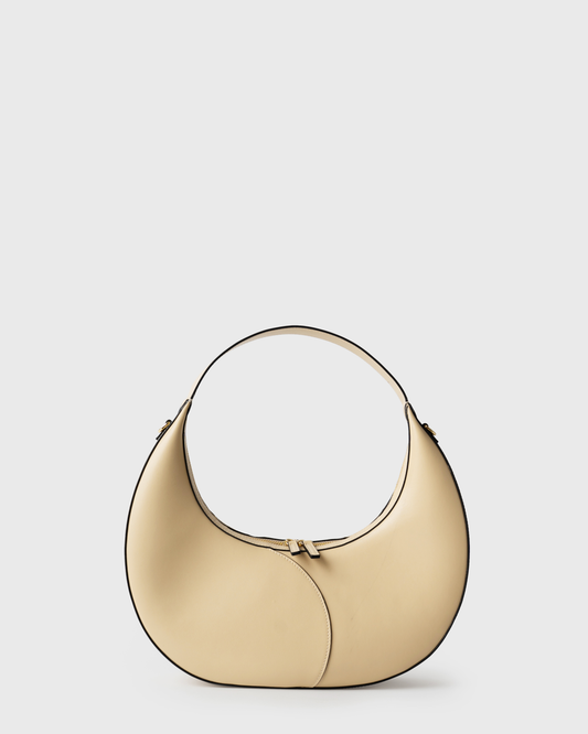 Big crescent-shaped shoulder bag in cream calf leather with curved handle