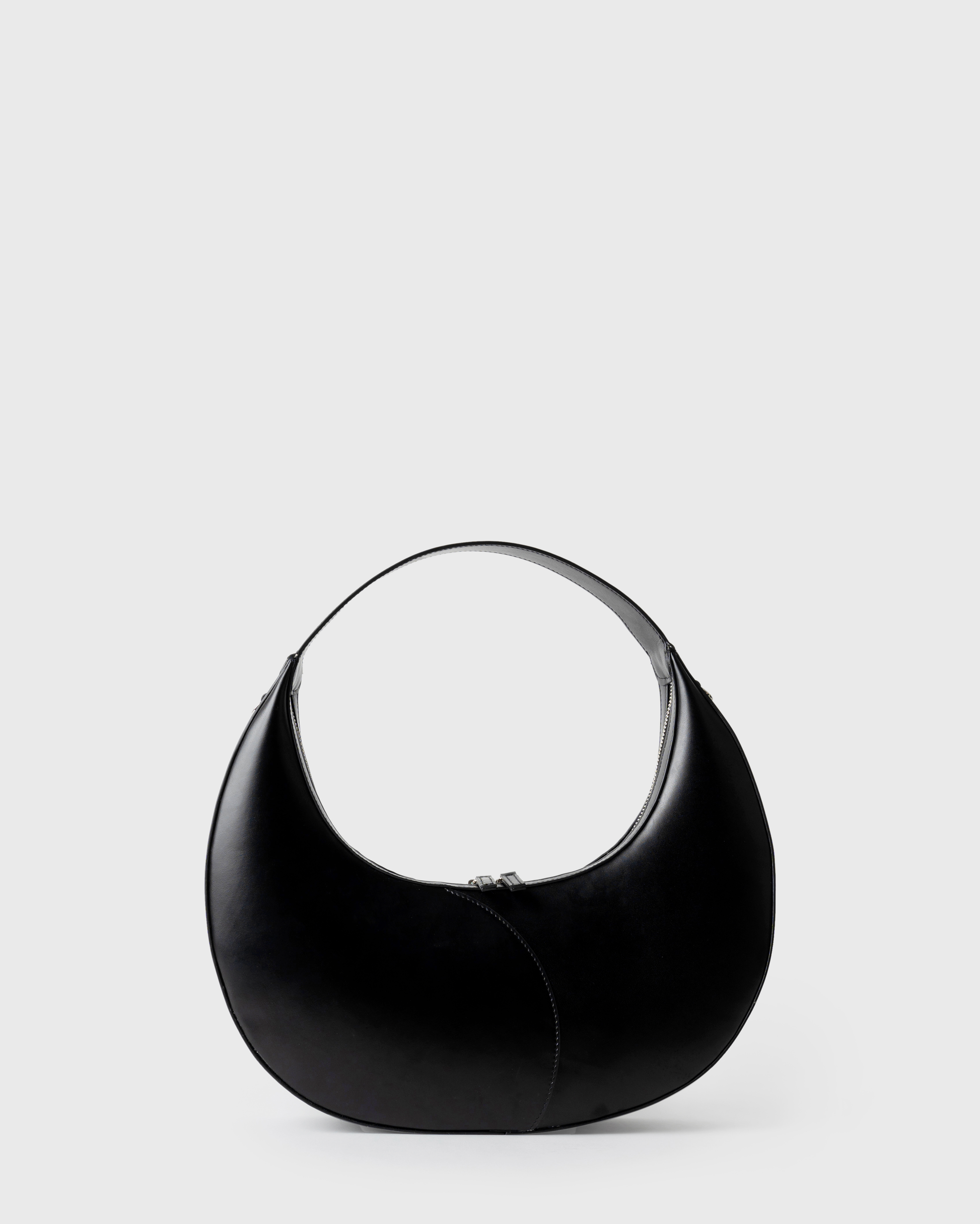 Big crescent-shaped shoulder bag in black calf leather with curved handle