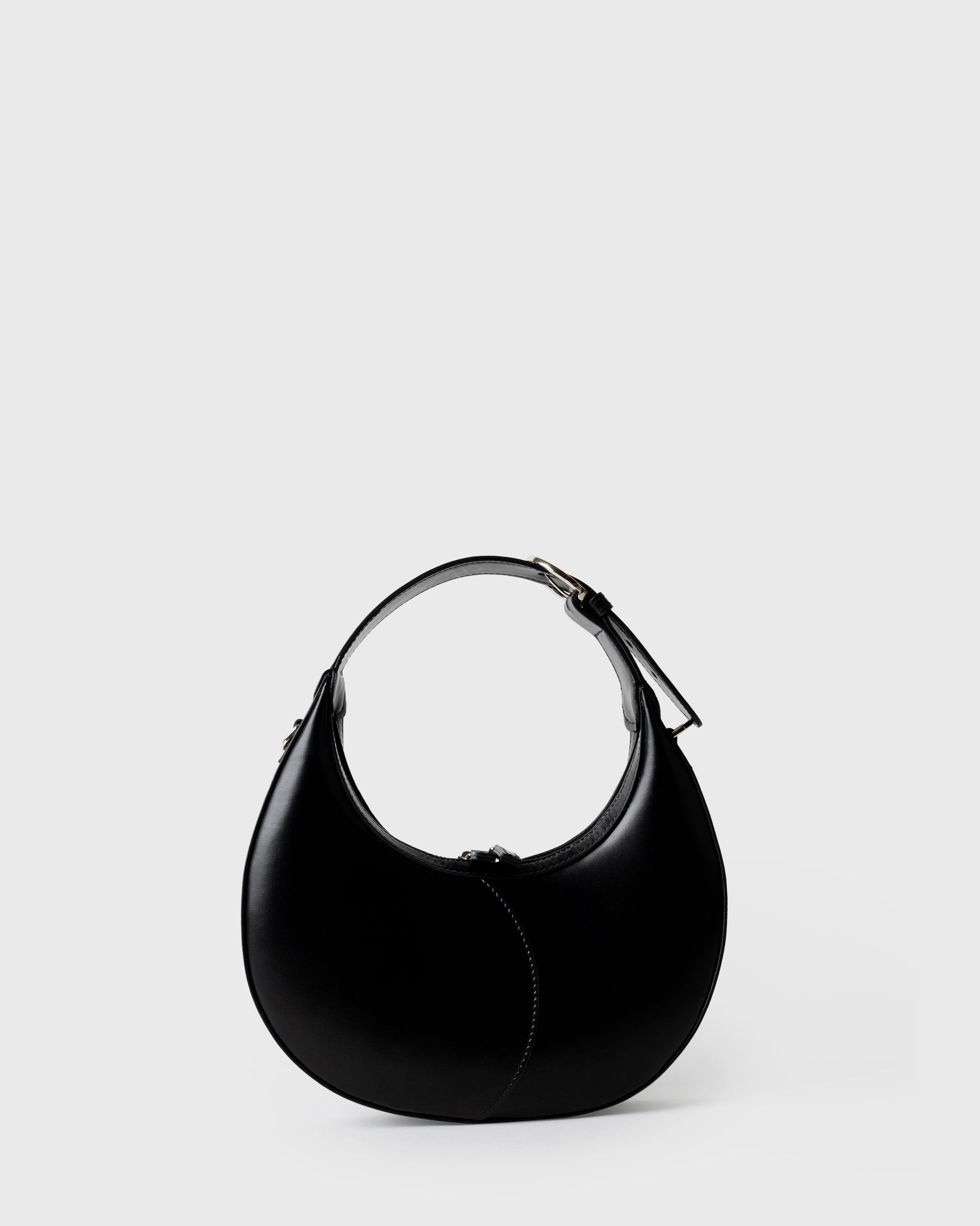 Mini crescent-shaped shoulder bag in black calf leather with curved handle